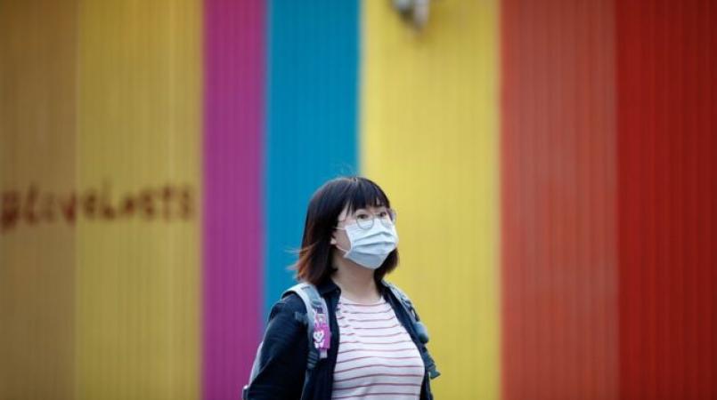 In Taiwan, anger at China over virus drives identity debate