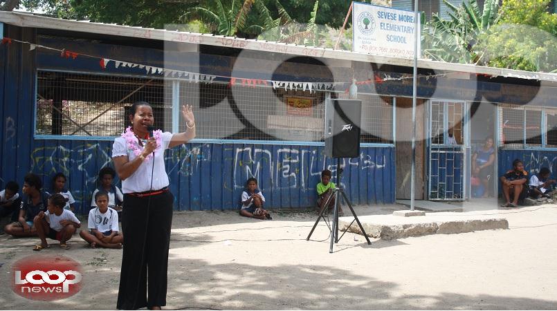 Digicel PNG Foundation CEO Beatrice Mahuru speaking at the Sevese Morea Elementary School before construction took place