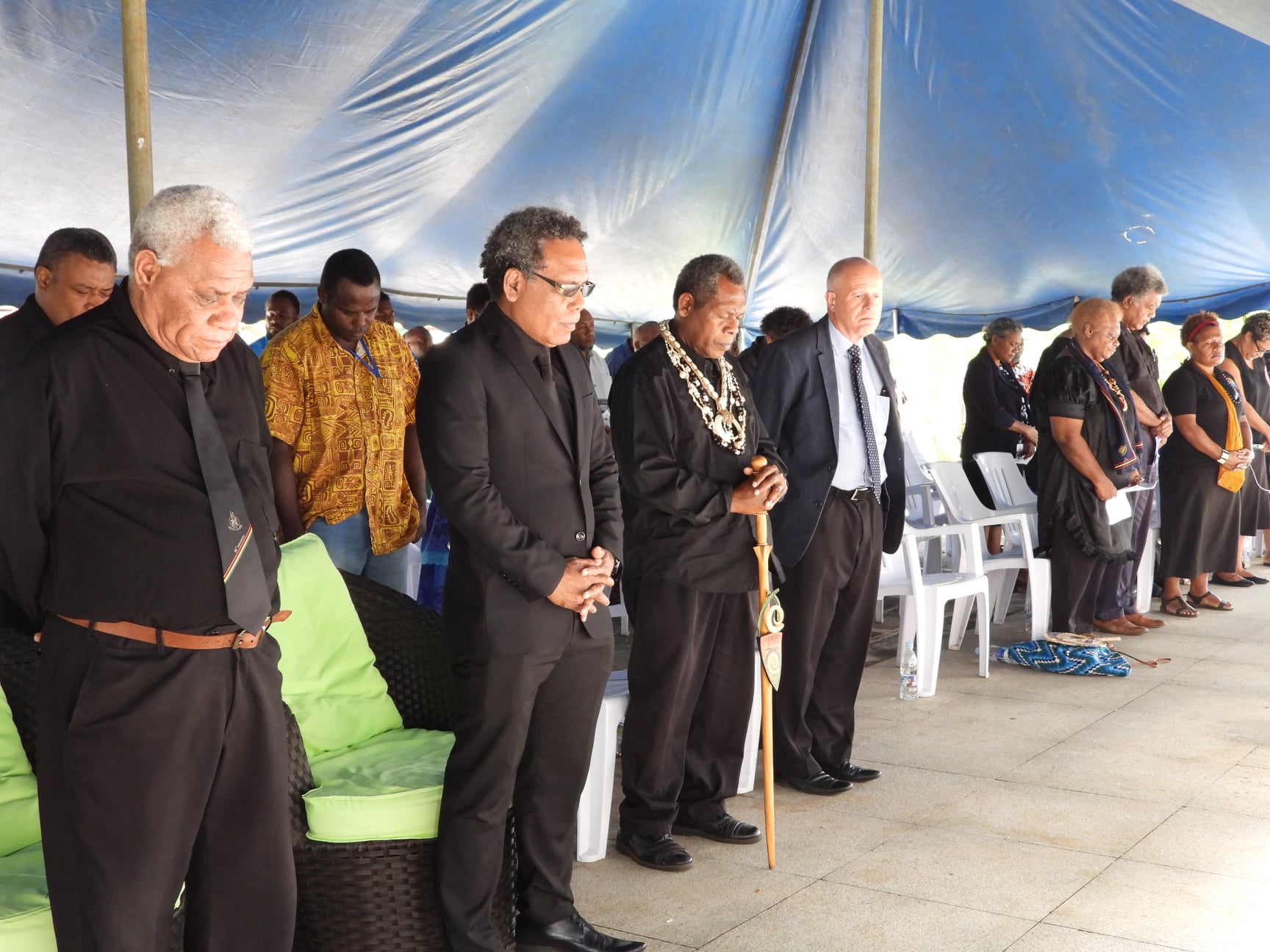 Vanuatu residents observing a minute of silence in respect of late Grand Chief Sir Michael Somare