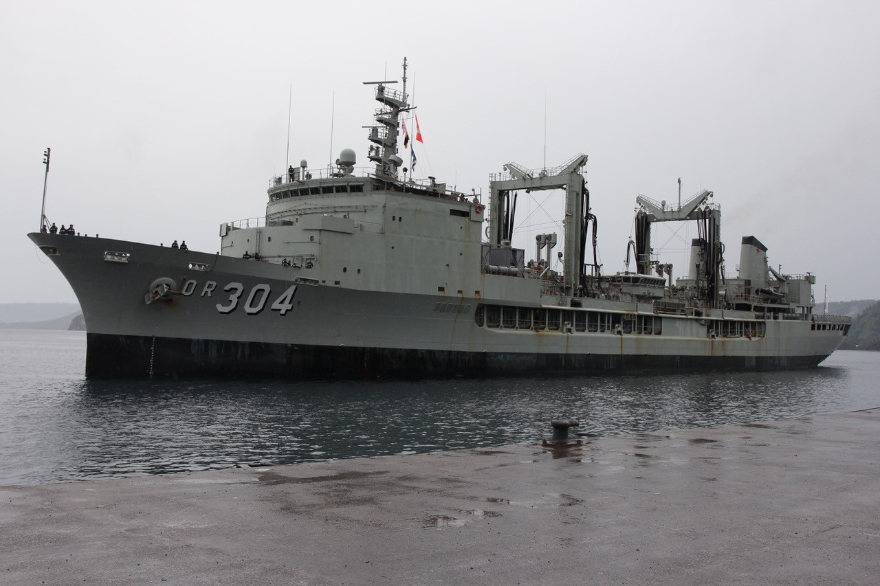 HMAS &#039;Success&#039; about to berth at Rabaul Wharf
