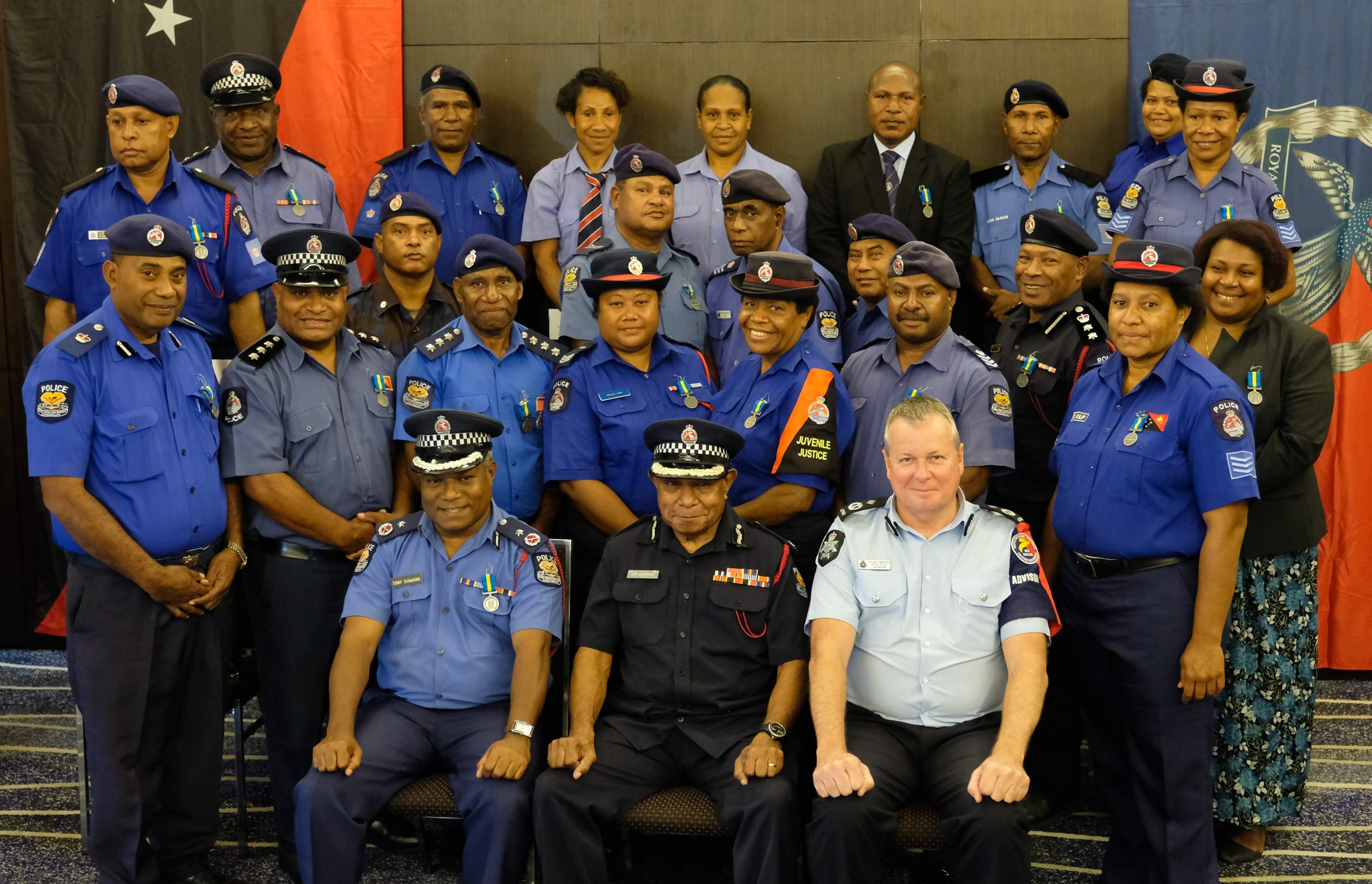 Seated from left is Assistant Commissioner of Police Logistics Tonny Duwang, Deputy Commissioner of Police and Chief of Operations Jim Andrews and Mission Commander of the PNG-Australia Policing Partnership Assistant Commissioner of Police Bruce Giles with the recipients of the  Royal Solomon Islands Police&#039;s International Law Enforcement Cooperation Medal at the Stanley Hotel in Port Moresby on Monday, Aug 13