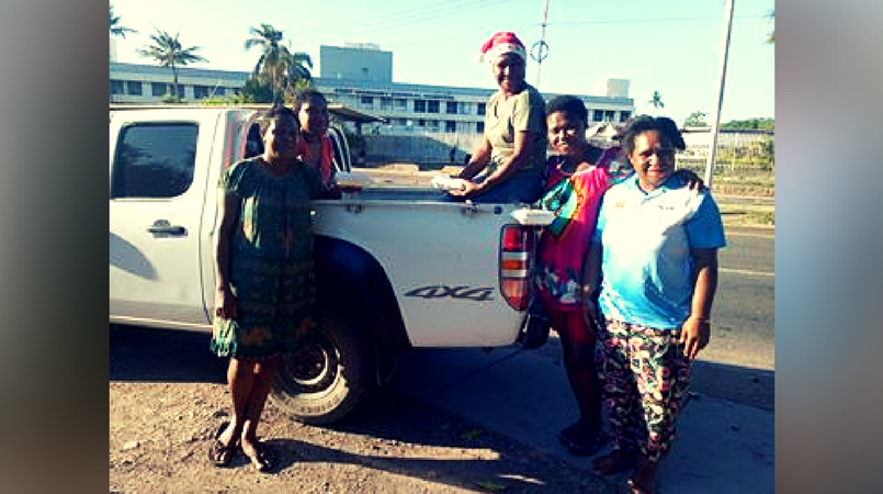 Out on the streets of Port Moresby - Taku family