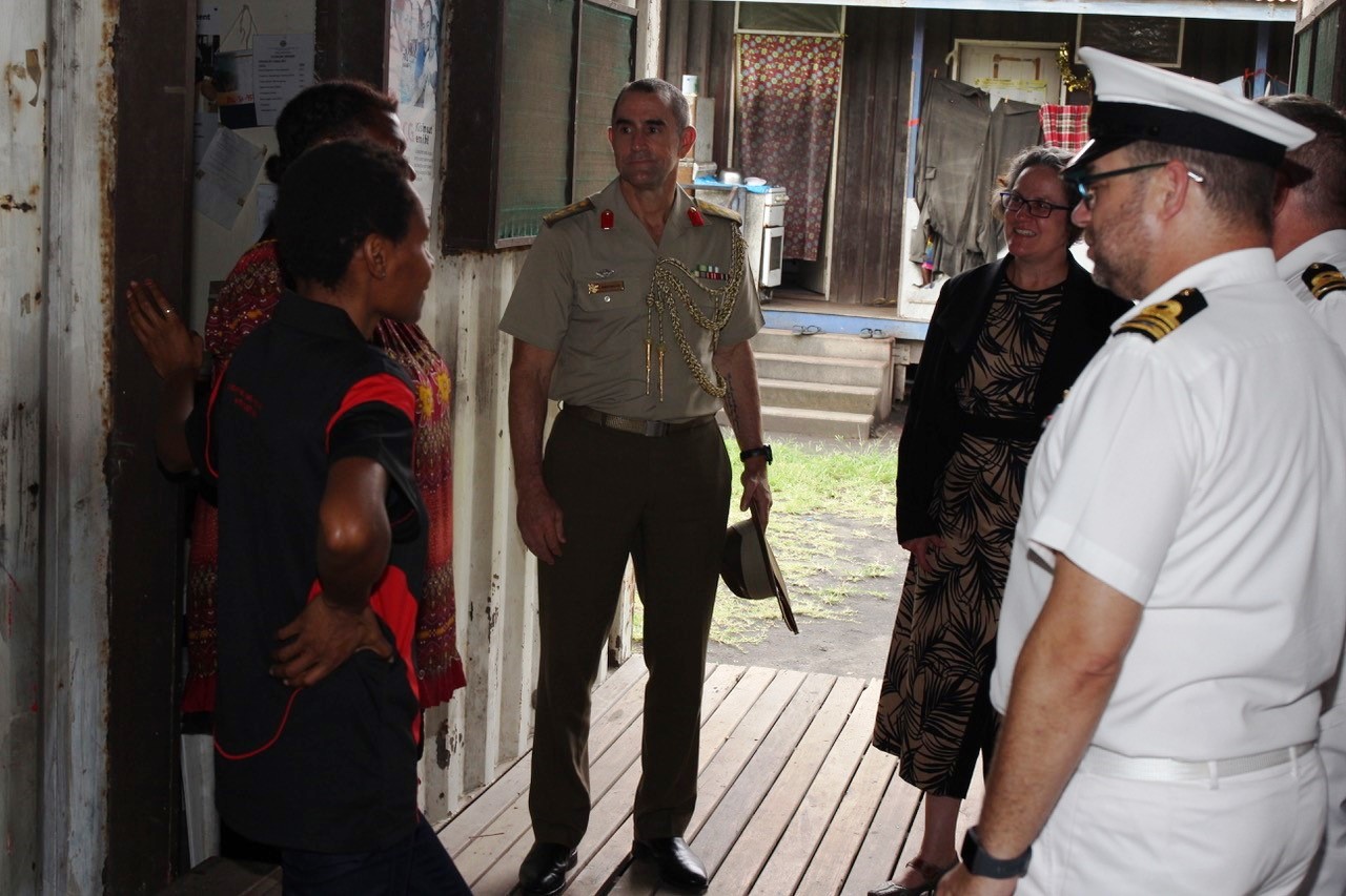 Deputy High Commissioner Caitlin Wilson, Head of Australian Defence in PNG, Col. Dave Buller at the Rabaul Community Women’s Clinic to inspect fencing work undertaken by crew members of HMAS Success