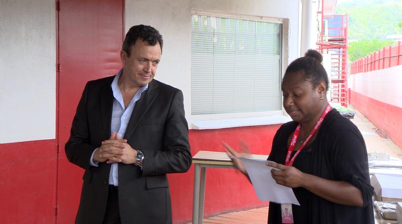Digicel PNG CEO, Valde Ferradaz, with a member of Digicel&#039;s social committee, Jessica Satbah