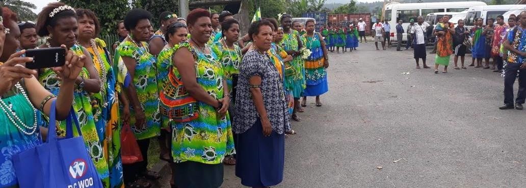 A group of policewomen from Morobe province attired in their meri blouse and awaiting transportation to attend a church service at Bitokara in Talasea, outside Kimbe town